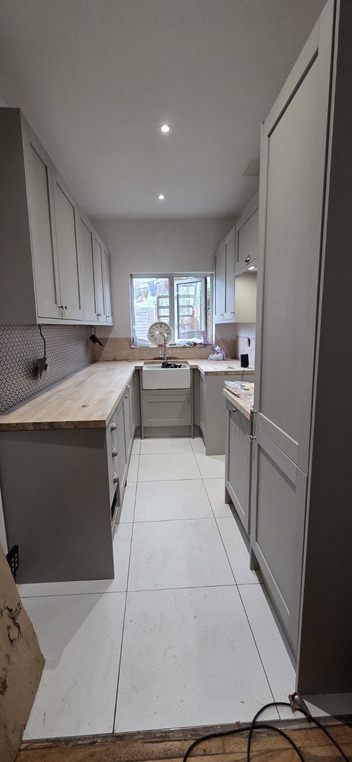 Kitchen installation showing the room and surrounding finishing work